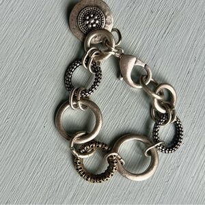 Elegant Silver and Gold-Tone Bracelet